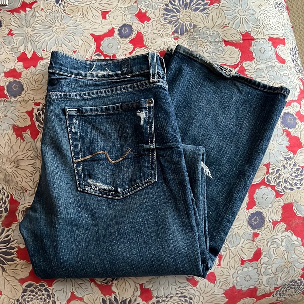 Distressed bootcut jeans